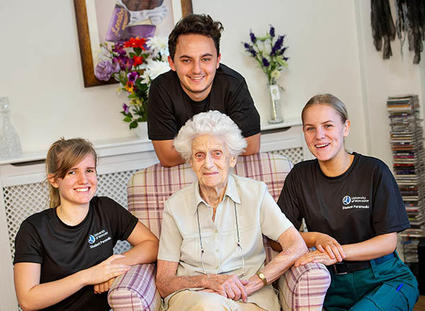 paramedics-sian-scott-jacob-thomas-and-chloe-tilley-with-resident-kathleen-rushton