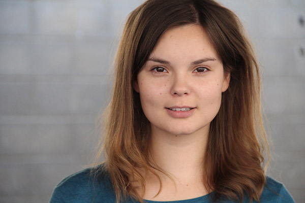 University of Worcester logo on a light blue background