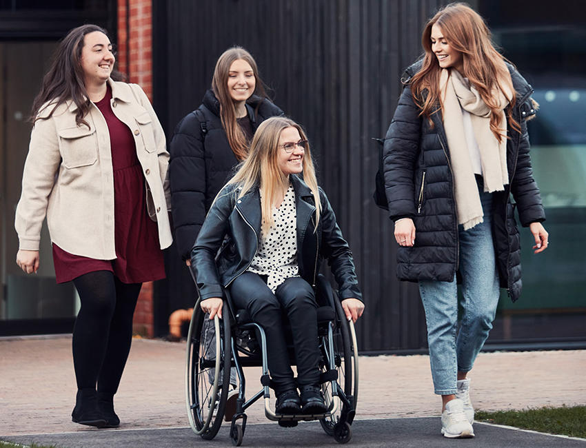 Students walking outside our St John's Campus main reception