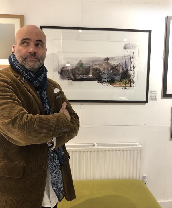 Jonathan Dukes with artwork