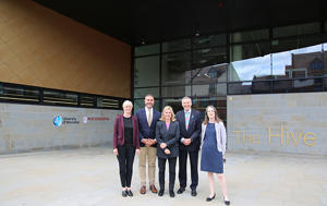 Justine Greening outside The Hive web