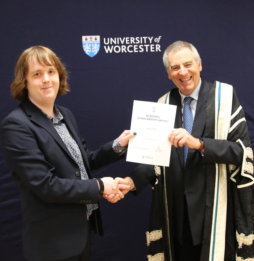 Student receives certificate