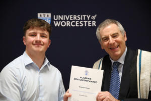 Student receives certificate