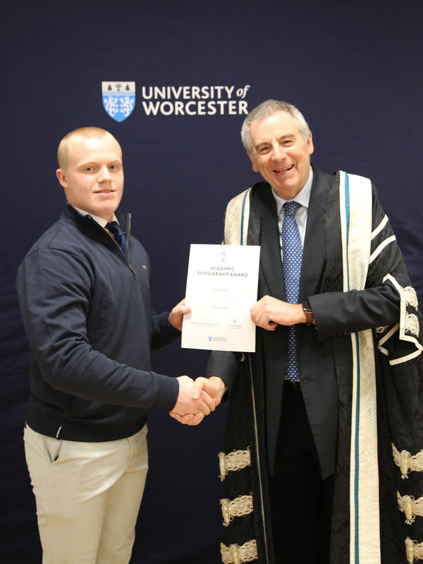 Student receives certificate