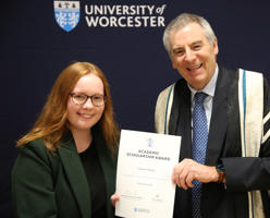 Student receives certificate