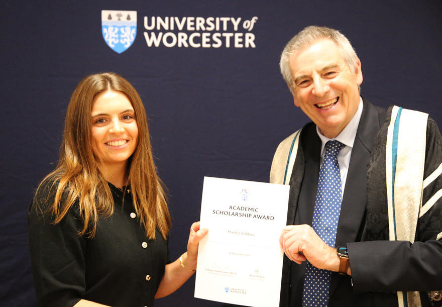 Student receives certificate