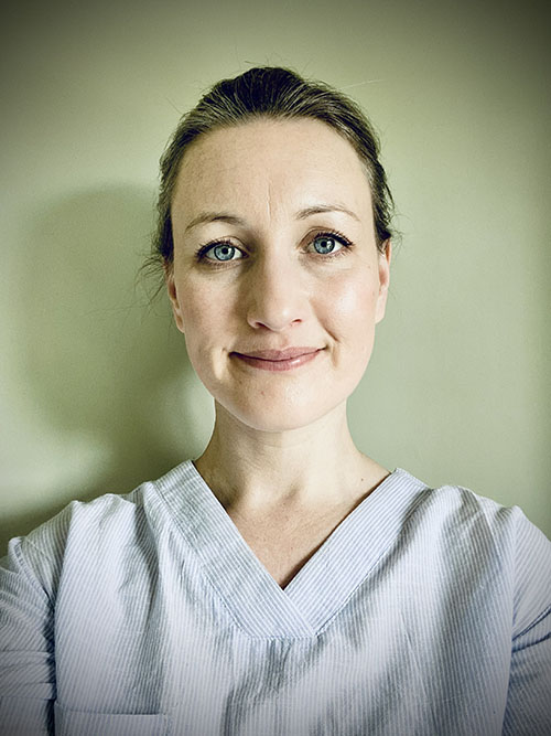 University of Worcester logo on a light blue background