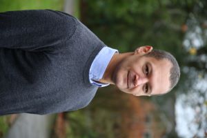 University of Worcester logo on a light blue background