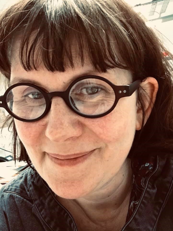 University of Worcester logo on a light blue background