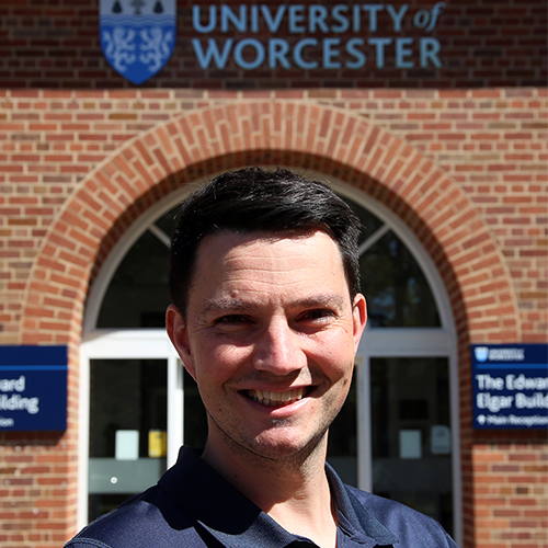 University of Worcester logo on a light blue background