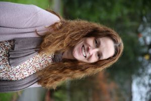 University of Worcester logo on a light blue background