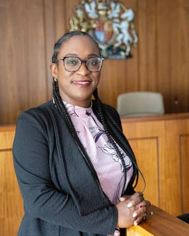 University of Worcester logo on a light blue background