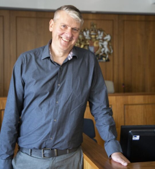 University of Worcester logo on a light blue background