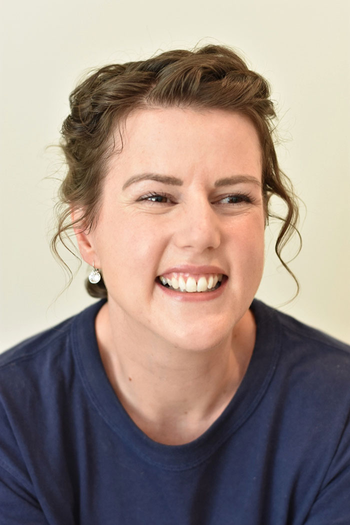 University of Worcester logo on a light blue background