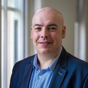 University of Worcester logo on a light blue background