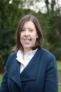 University of Worcester logo on a light blue background