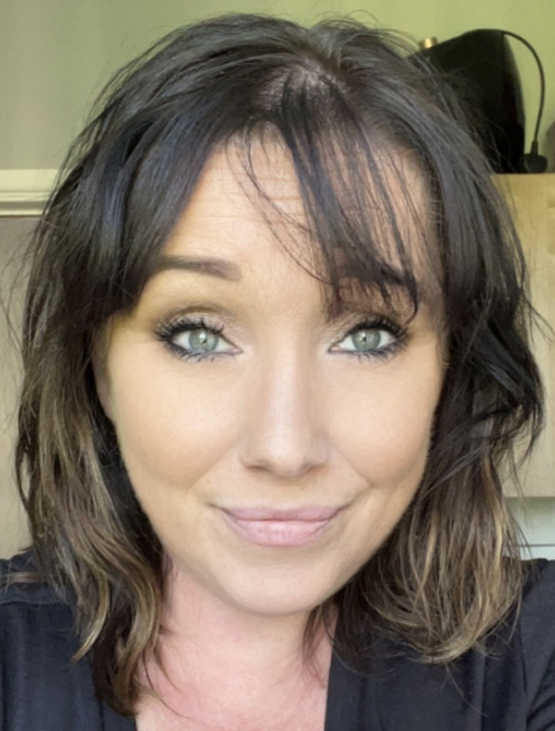 University of Worcester logo on a light blue background