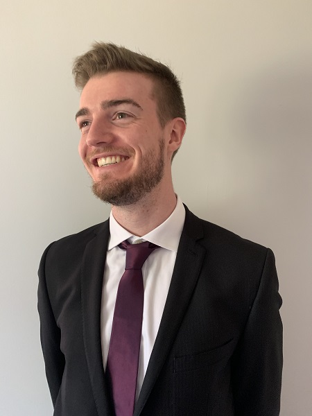 University of Worcester logo on a light blue background