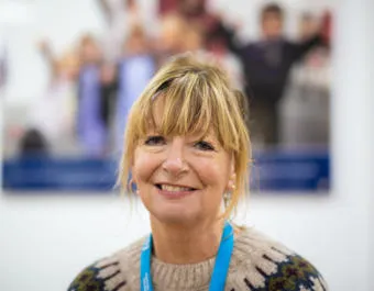 University of Worcester logo on a light blue background