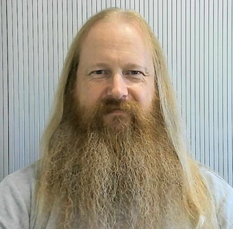 University of Worcester logo on a light blue background