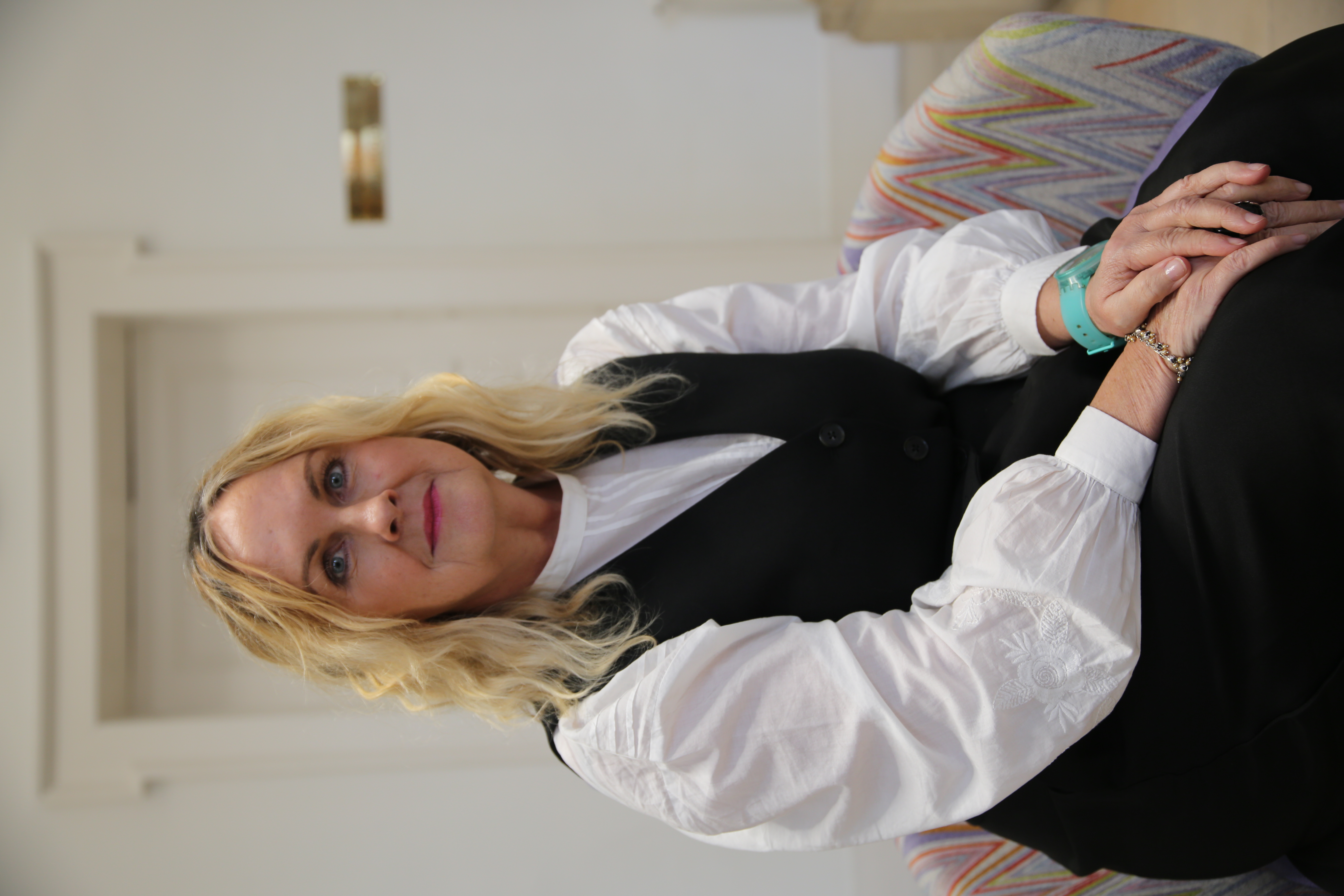 University of Worcester logo on a light blue background