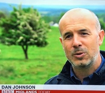 University of Worcester logo on a light blue background