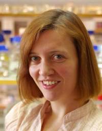 Dr Amy Cherry smiling at camera