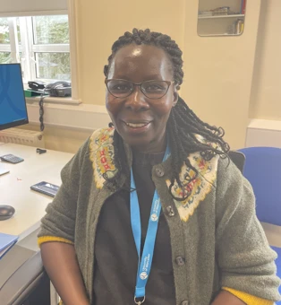 University of Worcester logo on a light blue background