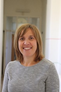 University of Worcester logo on a light blue background