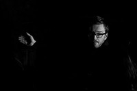 University of Worcester logo on a light blue background