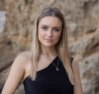 University of Worcester logo on a light blue background