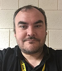 University of Worcester logo on a light blue background