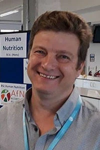 University of Worcester logo on a light blue background