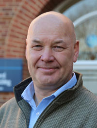 Leo Donnelly stood outside main reception at St John's campus, University of Worcester