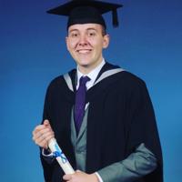 Liam Pinches in Graduation attire