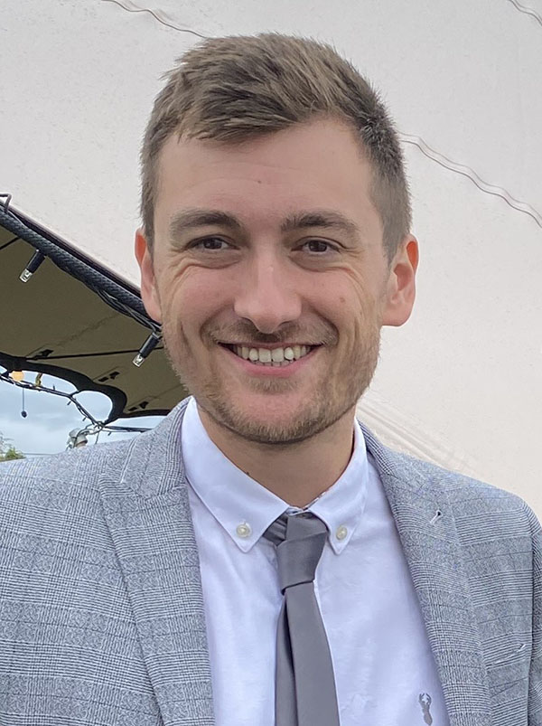 University of Worcester logo on a light blue background