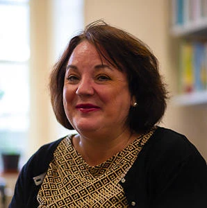 University of Worcester logo on a light blue background