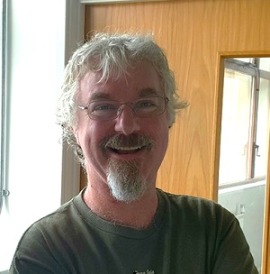 University of Worcester logo on a light blue background