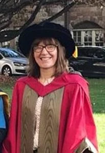 University of Worcester logo on a light blue background