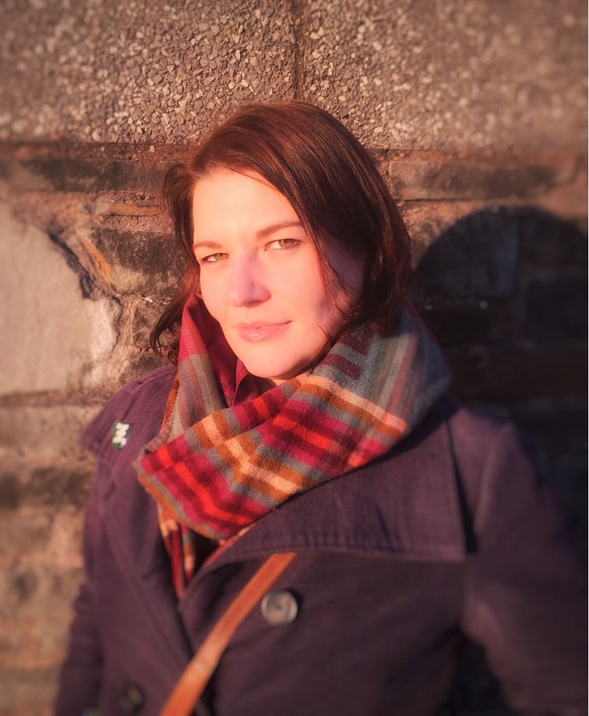 University of Worcester logo on a light blue background