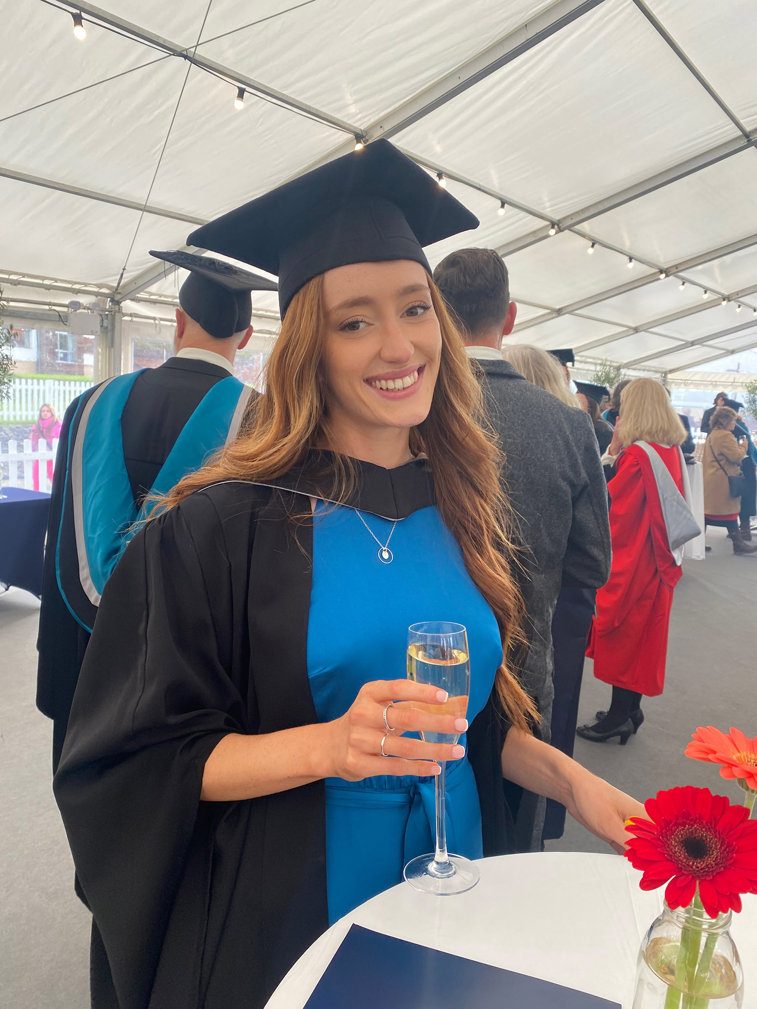 University of Worcester logo on a light blue background