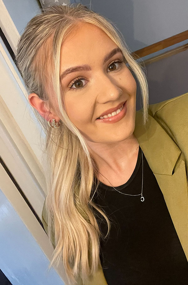 University of Worcester logo on a light blue background