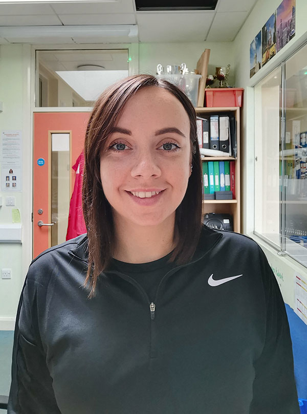 University of Worcester logo on a light blue background