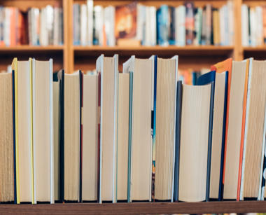 A close up shot of some books