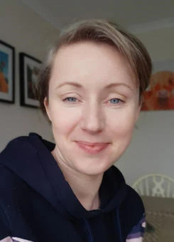 University of Worcester logo on a light blue background