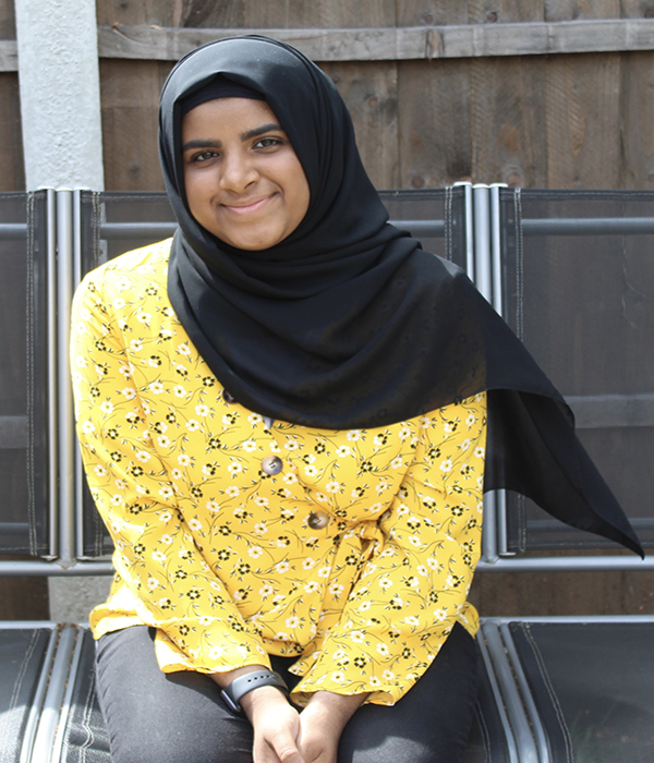 University of Worcester logo on a light blue background