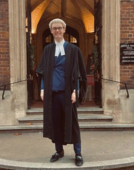 University of Worcester logo on a light blue background