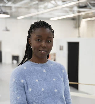 University of Worcester logo on a light blue background