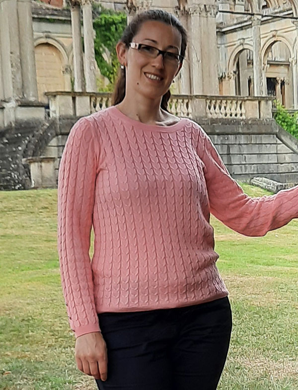 University of Worcester logo on a light blue background