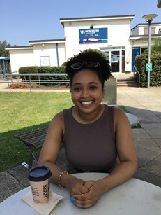 University of Worcester logo on a light blue background